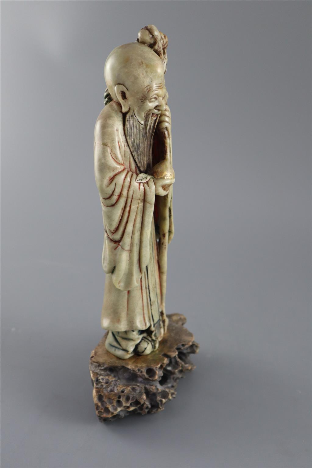 A Chinese soapstone figure of Shou Lao, 18th century, 28.5cm high